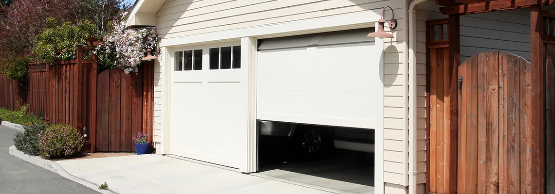 Fix Metal Garage Door Jerking in Ormond Beach